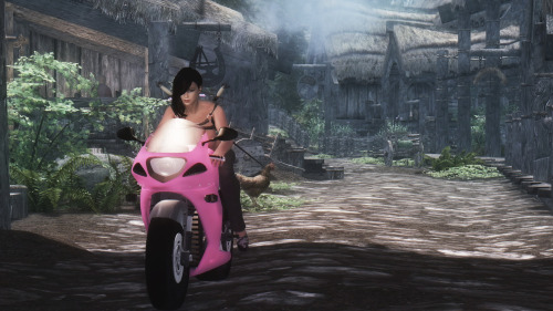 Sinclari rolls out from the Riverwood barber shop on her new ride.