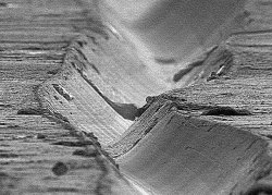 vaticanrust:  Groove on a vinyl record at 1000x magnification