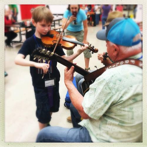 <p>Here’s a former student of mine - this is Tarquin, friends. He’s also taken some lessons from @lukeplusrach and @fiddlerjustinbranum and I think he’s working with the lovely @deanier these days and the point is, this kid is a real musician. He has really mature ideas and never gets tired of playing and experimenting and I just love how his brain works. He’s fearless and loving. Be like Tarquin. #fiddle #fiddlecontest #weiser #swing #jazz #tarquinisacoolname (at National Oldtime Fiddlers’ Contest & Festival)</p>