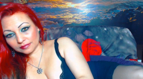 A heavy painted redhead MILFâ€¦love the makeup!http://www.bangmecam.com/en/chat/01HOTWIFEhttp://www.bangmecam.com/en/modelswanted