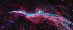   The Veil Nebula is a cloud of heated ionized gas and dust