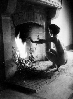 frenchvintagegallery:    Naked, in front of the fireplace, 1946.