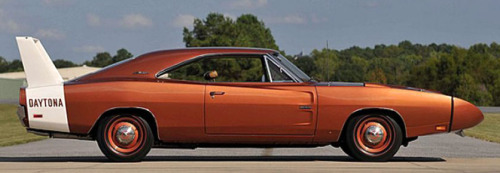 carsthatnevermadeit:  Dodge Charger Daytona, 1969. A series of 503 road cars built for homologation purposes for NASCAR racing with aerodynamic noses and a 23 inch rear spoiler