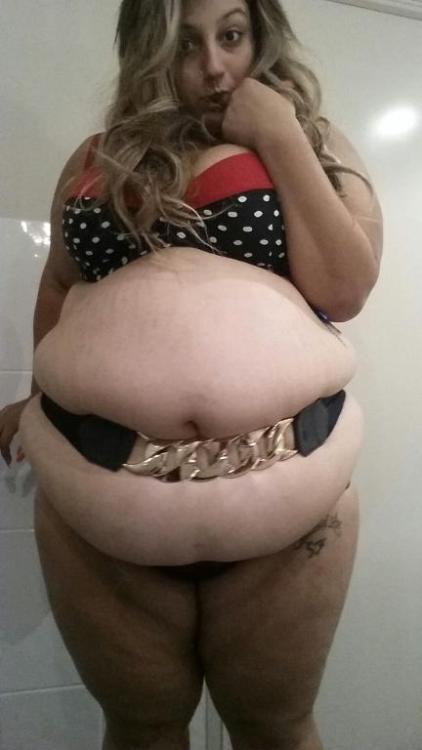 digitalmiscreant:  All 64" of Ms Chunky’s preposterous gut, stuffed to maximum capacity.