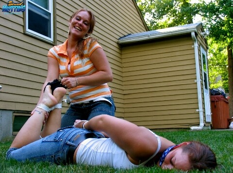 henrythehangman:  thexpaul2:  Backyard bondage with Trinity & Raven   Lezdom smothering and gag