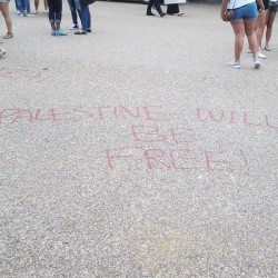 Defacing the road in front of the white house. Makes it look
