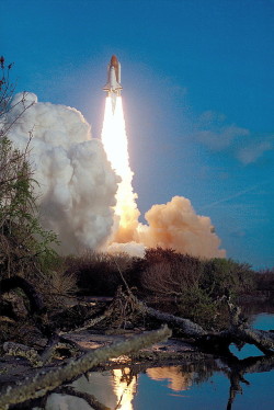 humanoidhistory:The Space Shuttle Challenger blasts off on February