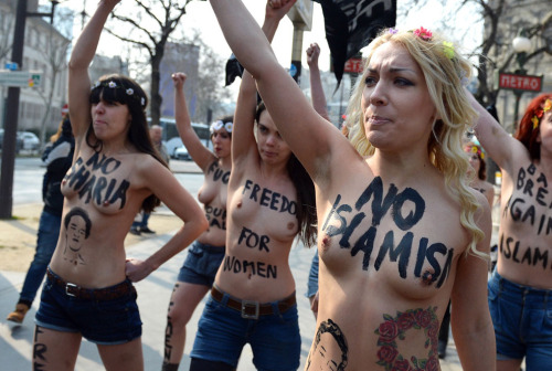 ncpunx:   stonerswithboners:  adventuresinhires:  Members of Ukrainian feminist group Femen staged protests across Europe as they called for a â€œtopless jihad.â€ The demonstrations were in support of a young Tunisian activist named Amina Tyler. Last