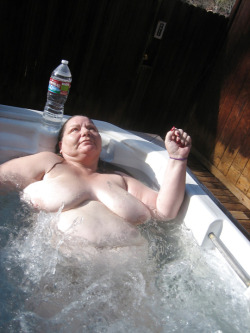 Mmmmmm looks like this hefty older lady is enjoying her bath