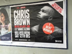 Someone has defaced a bunch ofChris Brown tour posters inthe