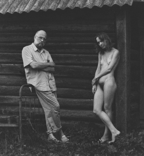 this this guy is brought his completely naked wife from head to toe outside for all to see. She has small boobs with a big bush. Very nice legs and feet. He looks very proud.