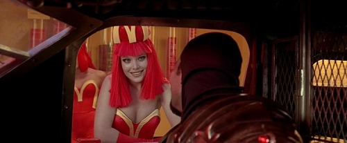 cisforcostumes: Working Girls and Uniforms: McDonalds, Flight Attendants, Receptionist, Hostess Film: The Fifth Element (1997) Costumes by Jean Paul Gaultier 