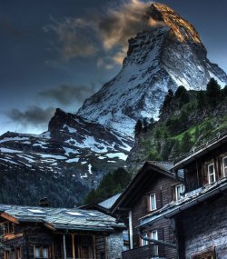To dwell in the shadow of a giant (Zermatt village, Switzerland,