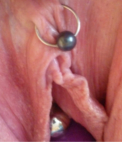 pussymodsgalore  HCH piercing at the top, and what I think is