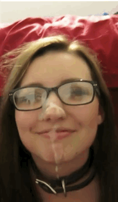 Cute 18-year-old with glasses licks cum off her mouth