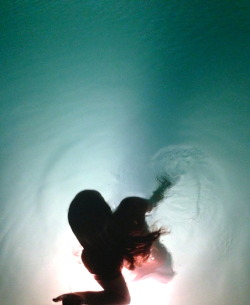 euph0rius:  took this of my sister one  night in the pool 