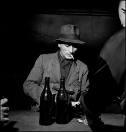 historium: A coal miner receives his alcohol ration. Essen, Germany,