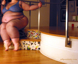 thegoldenboy2050:  Her pose is as playful as the mosaic stairs