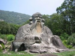 sixpenceee:  Stone statue of Laozi at the foot of Mount Qingyuan.