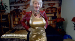 Gorgeous fit busty granny in a tight gold minidress and red leather