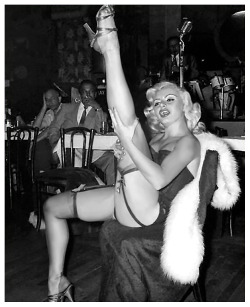 burleskateer:Rita Grable kicks up a shapely leg, during a performance