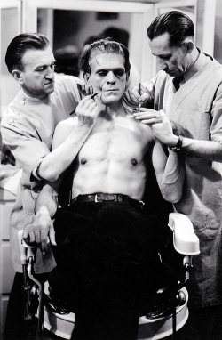  Boris Karloff gets made up by Jack Pierce and assistant for