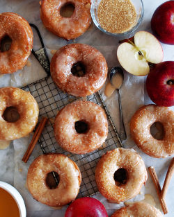 sweetoothgirl:  Cinnamon Apple Doughnuts with Cider Glaze