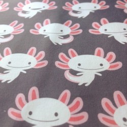 sqoozh:  petitspixels:  Fabric of the day : Cute axolotls. http://www.spoonflower.com/fabric/2409278