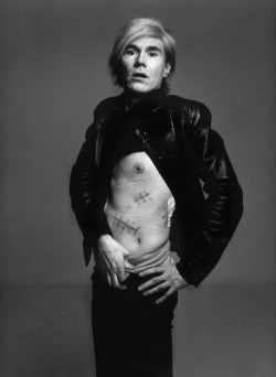 Andy Warhol in 1969, showcasing the scars left on his body after