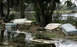 sixpenceee:  During Hurricane Ike in 2008, dozens of caskets