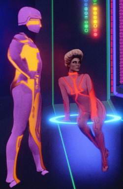 allronix:verticalfilm:TRON (1982)Two denizens of Encom’s Red