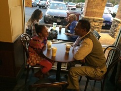 stunningpicture:  Took a picture of a man and daughter at a coffee