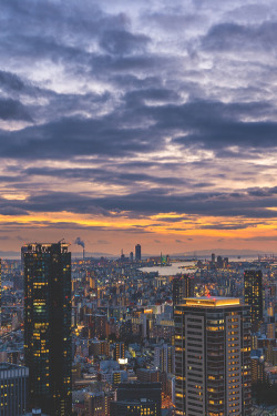 visualechoess:  Sunset over Osaka by: Joshua Davenport  