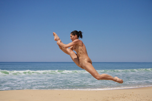 Dancer training on nude beach.