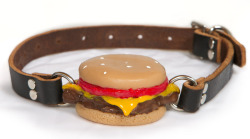   Silencing Slider Cheeseburger Ball Gag by Gorge Ohwell. It’s