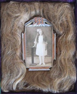 Photograph of Mary H. Helgeson surrounded by her actual hair.