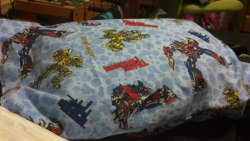This is a hand sewn Transformers pillow I made for my love, PatticusPrime