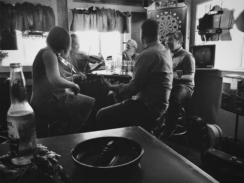 <p>Well, here’s just about my favorite thing that’s happened at #weiser - Old time  jam at Clifford’s in the air conditioning with some of my absolute favorites. Best afternoon ever. #oldtime #fiddle #tenorguitar #harmonica #yepyoucansmokeinthere #thesaubers  (at Clifford’s Tavern)</p>