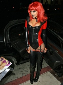 sexyinleather:  Carmen Electra: Leather Bodysuit Halloween Costume