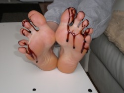 femdomgames:  Pour some chocolate sauce over your feet and make