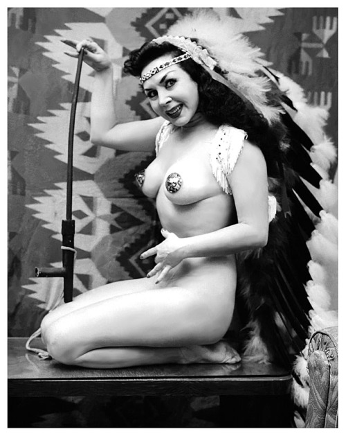 burleskateer:  Do May shows off her Peace Pipe.. 