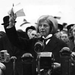 British Prime Minister Theresa May addresses the crowds as she returns from her meeting with President Trump in Washington.