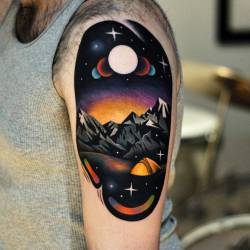 tattoofilter:  Psychedelic landscape tattoo on the left upper