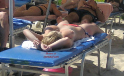 huge tits on beach voyeured