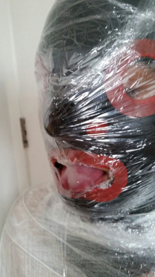 Slave Qwerty has an encasement fetish, so I wrapped him up in some cling film, and teased his cock with a vibrator. London, April 2015.