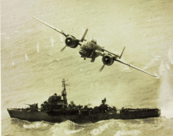 demons:  A B-25 Mitchell strafing a Japanese vessel in the Pacific