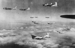 usaac-official:  379th Bomb Group B-17s in formation during a