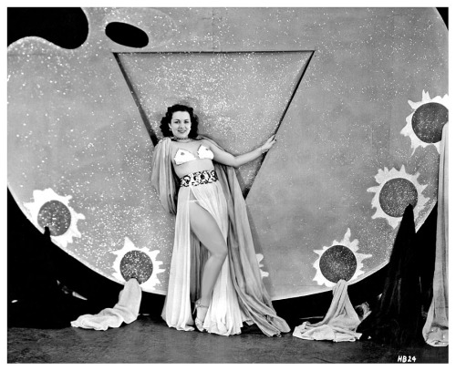 Marie Durand  As featured in a publicity photo from Duke Goldstone’s 1949 Burlesque film: “HOLLYWOOD BURLESQUE”.. A documentary-style recording of a complete Burlesque show,— as filmed in 1948 at the ‘HOLLYWOOD Theatre’; located