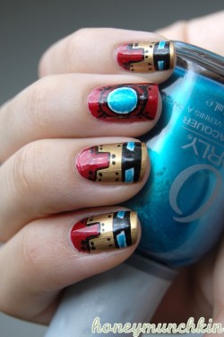 fashiontipsfromcomicstrips:   Manicure Monday: Iron Man, by HoneyMunchkin