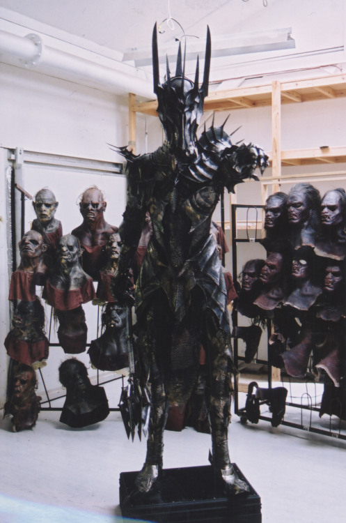 costumefeverrr:  Sauron’s armour worn in The Lord Of the Rings  I can totally recognize some of those masks… bottom left is the orc who tried killing Mary and Pippin in the forest.